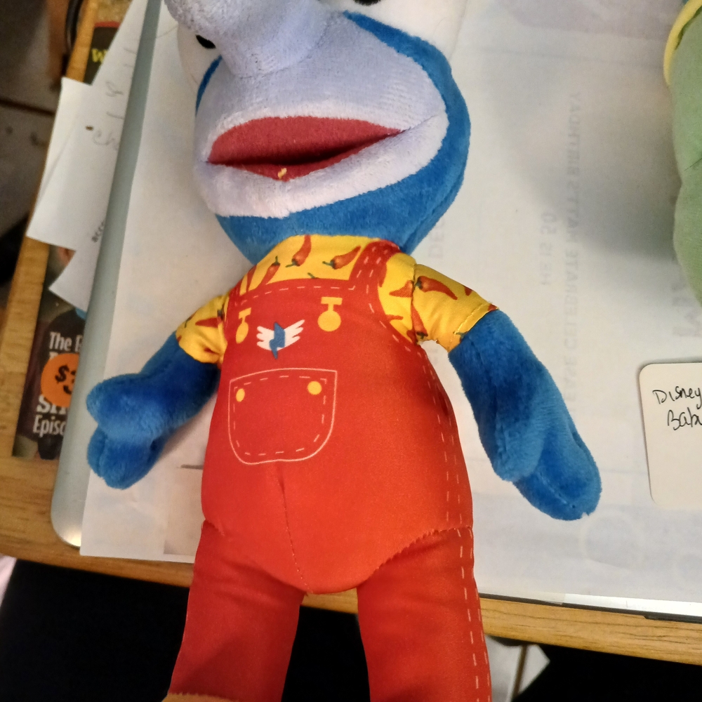 Disney Blue Plush Toy with Red Overalls and Yellow Shirt